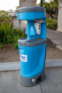 portable hand wash station on a concrete